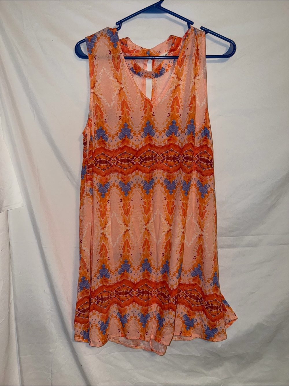 En Crème Peach Floral Sleeveless Top with Orange & Blue Accents